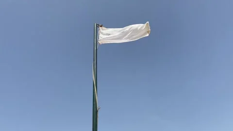 Beach white flag weather wind on blue sky background, Stock Footage 277524751