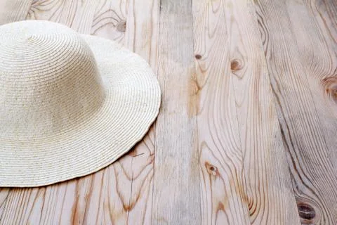 Beach white hat on clear pine wood Stock Photos