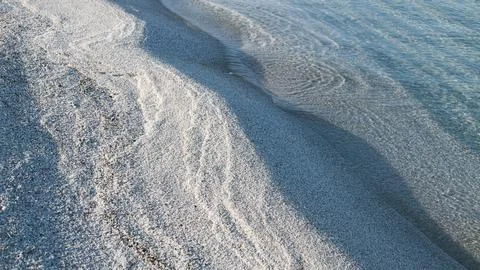 Beach of white quartz grains, like grains of rice, Arutas Beach Stock Photos