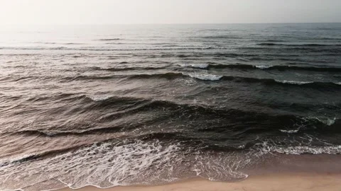 Beach with white sand and the blue sea. Aerial top down view Video stock 219969474