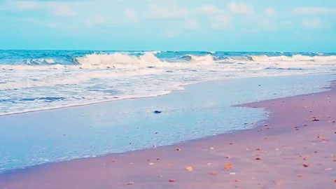 The beach with white waves during sunset at Maharat Beach, Songkhla, Thailand Stock Footage 154620140