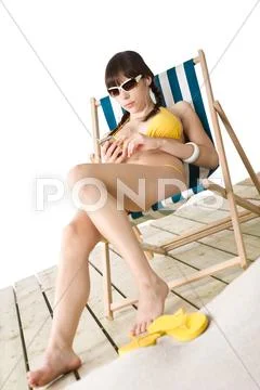 Beach - Woman Listen To Music In Bikini