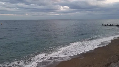 Beach in Yalta in the evening top view 4K Stock Footage 127364880