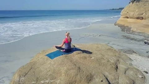 Beach Yoga - Circle behind back Vídeo Stock 84831657