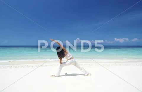 Beach yoga Stock Photos