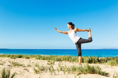 Beach yoga Stock Photos