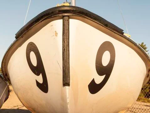 Beached sailboat bow Stock Photos
