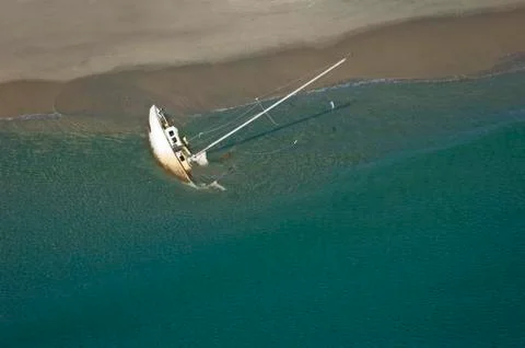 Beached sailboat Stock Photos