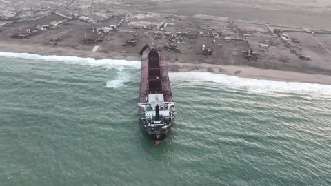 Beached Vessel at Gadani Breaking Yard, Pakistan. Aerial Panoramic Stock Footage 258428315