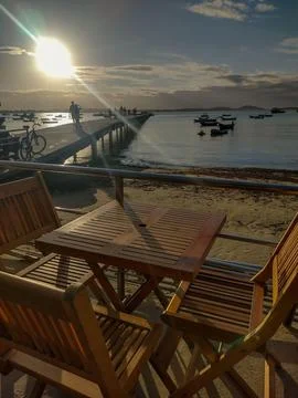 Beachfront cafe at sunset Stock Photos