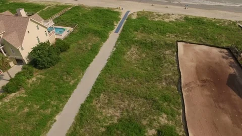 Beachfront property on the ocean Stock Footage 167372885