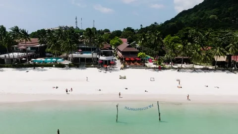 Beachfront resort with white sand and turquoise waters. Haad Rin. Ko Pha Ngan Stock Footage 301943860
