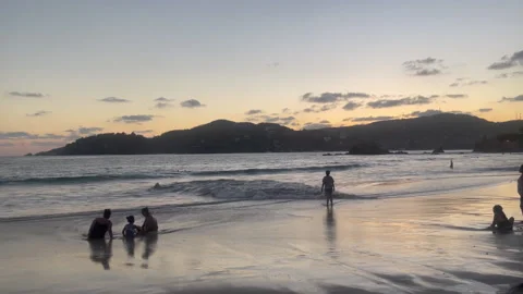 Beachgoers Look at Sky HD Stock Footage 175893982