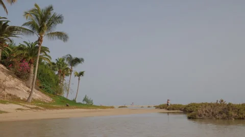 Beachgoers at Playa Sotavento Lagoon Stock Footage 268916048