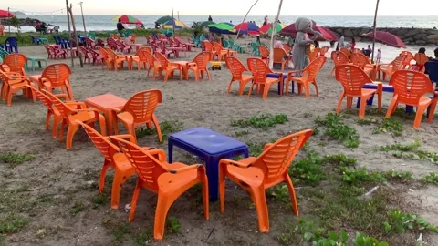Beachside Bliss: Unwind and Dine in Nature's Embrace Stock-Footage 243490662