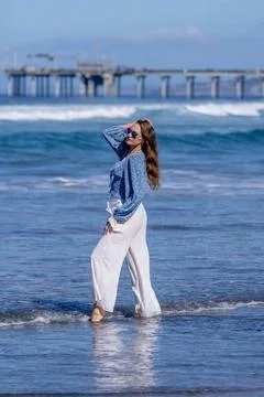 Beachside Elegance: A Day of Serenity by La Jolla Pier with Radiant Blue S... Stock Photos