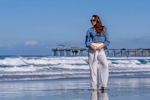 Beachside Elegance: A Day of Serenity by La Jolla Pier with Radiant Blue S... Stock Photos