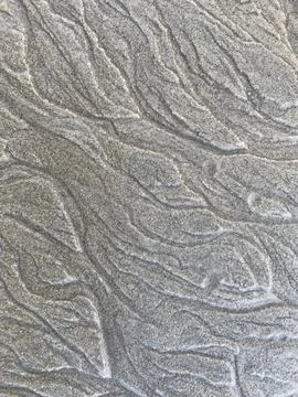 Beachside sand background Stock Photos