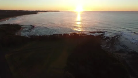 Beachside sunset looking out over ocean Video stock 132310445