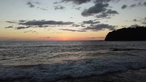 BeachSunsetFlyBack Stock Footage 177587761