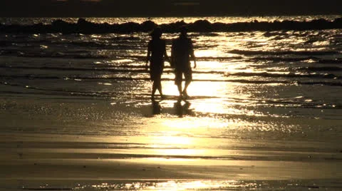 Beachwalk at sunset Stock Footage 26949009