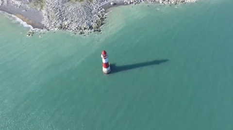 Beachy head light house Tilt up to Beachy Head Cliffs - Drone Stock Footage 67536864