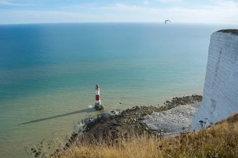 Beachy Head Lighthouse, summer evening at Seven Sisters Country Park, England Stock Photos