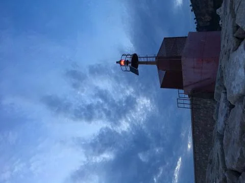 Beacon on pier Stock Photos