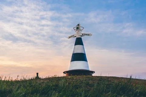 Beacon with the pointer on the hill in sunset light Beacon with the pointe... Foto stock