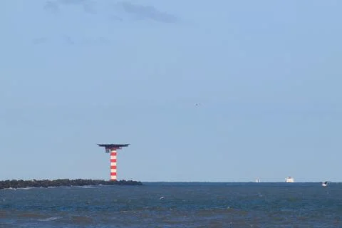 Beacon in the sea Stock Photos