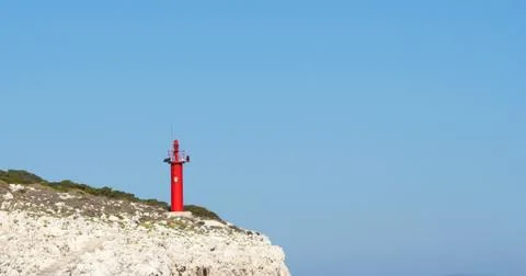 Beacon on top of the cliff Stock Photos