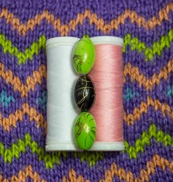 Beads and reels of thread Stock Photos