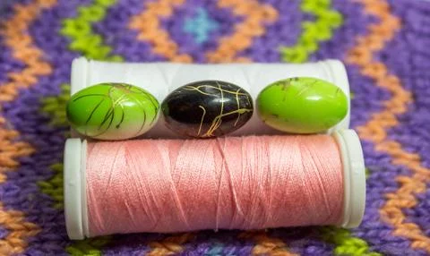 Beads and reels of thread Stock Photos
