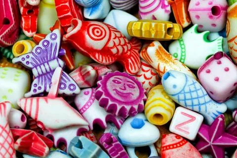 Beads colourful Multi colour plastic beads elements variety assortment Cop... Stock Photos