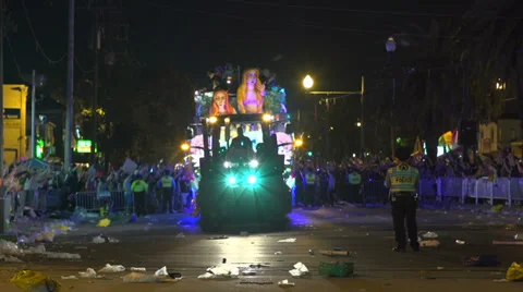Beads flying from float in Endymion parade at night Stock Footage 37509854