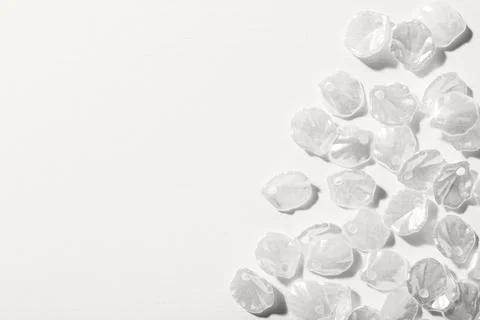 Beads in shaped of sea shells on white background Stock Photos