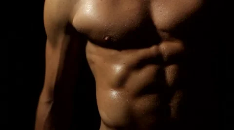 Beads of sweat running down sport male naked body Stock Footage 53674878