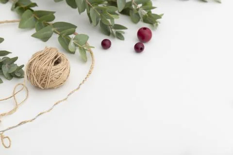Beads, twine and eucalyptuss. The process of creating a autumn wreath Stock Photos
