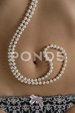Beads On Woman\'s Belly, Full Frame