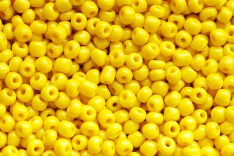 Beads of yellow colour Stock Photos