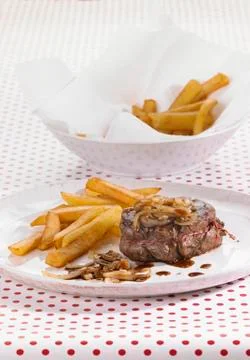 Beaf steak with chips Stock Photos