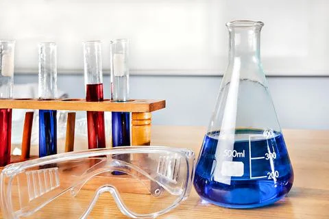 Beaker and sample test tubes on the table Stock Photos