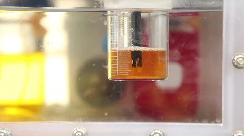 Beaker experiment in modern science lab 2 Video stock 65294580