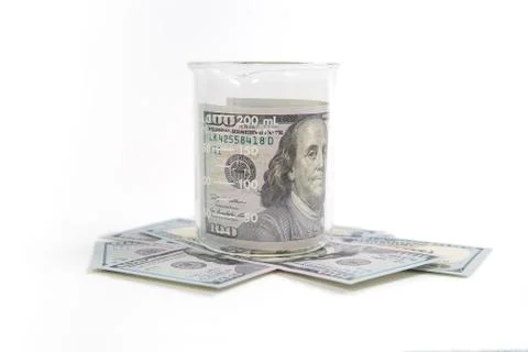 Beaker with money Stock Photos
