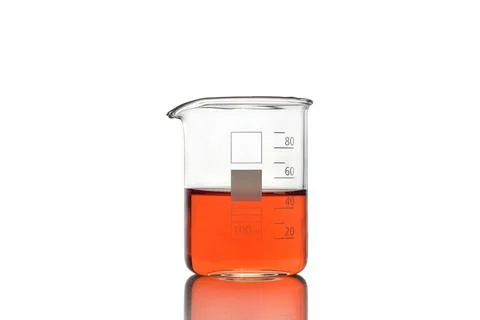 Beaker with red liquid on white background Stock Photos