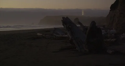 The beam of Cape Blanco Lighthouse in the  twilight, Oregon Stock Footage 127605562