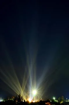 Beam could into the dark sky 写真素材