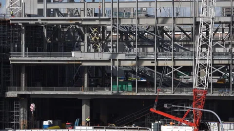 Beam craned up on building site Stock Footage 52338939