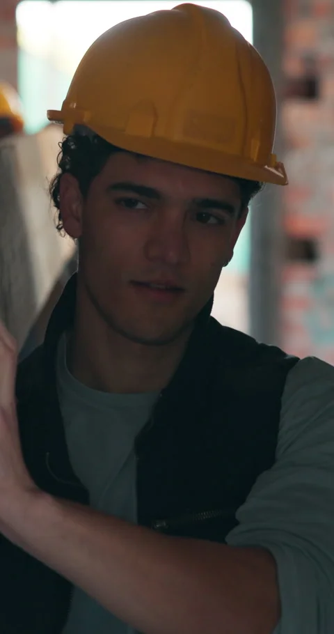 Beam, engineer and help with man on construction site for team, renovation and Stock Footage 340969689