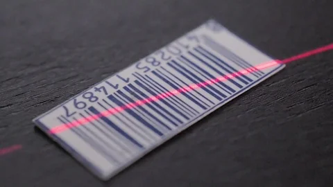 Beam of laser light on a rotating bar code. Stock Footage 74723599